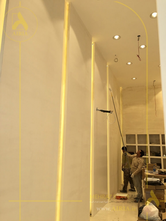 آخرین مرحله نقاشی کناف دیوارها در بازسازی طراحی داخلی و دکوراسیون داخلی فروشگاه-ونک